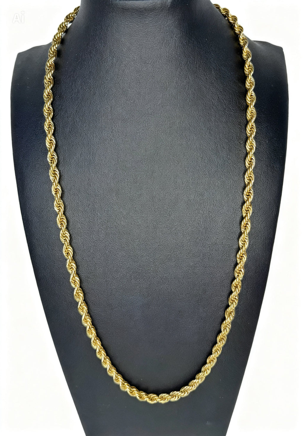 Gold rope chain necklace on a black mannequin