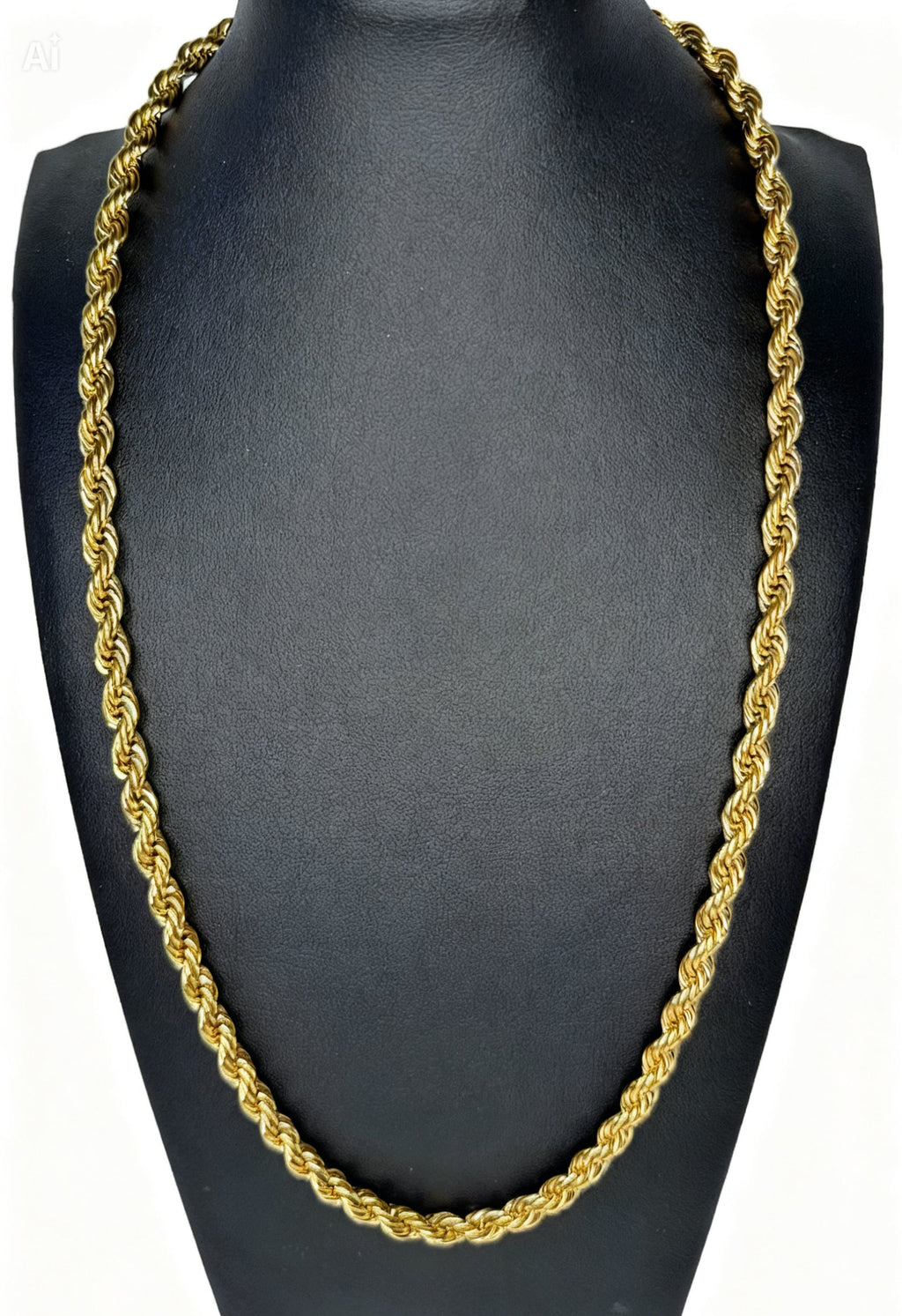 Gold rope chain necklace on a black mannequin