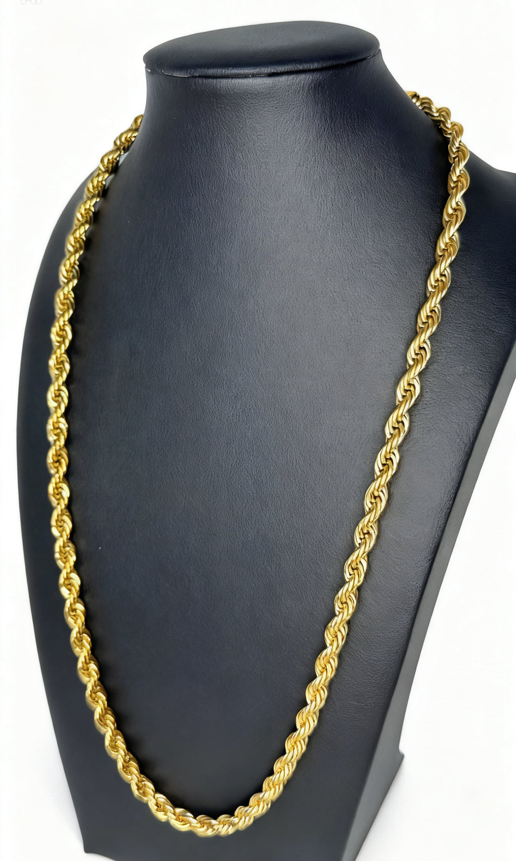 Gold rope chain necklace on a black mannequin bust