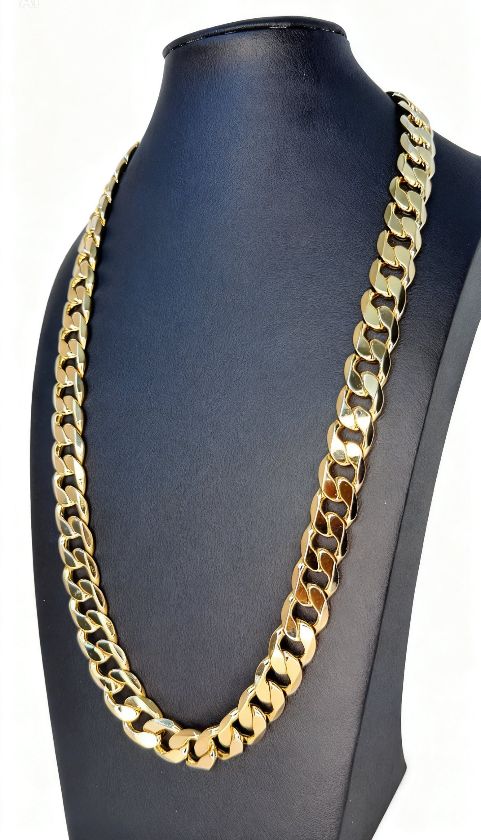 Gold chain necklace on a black mannequin bust
