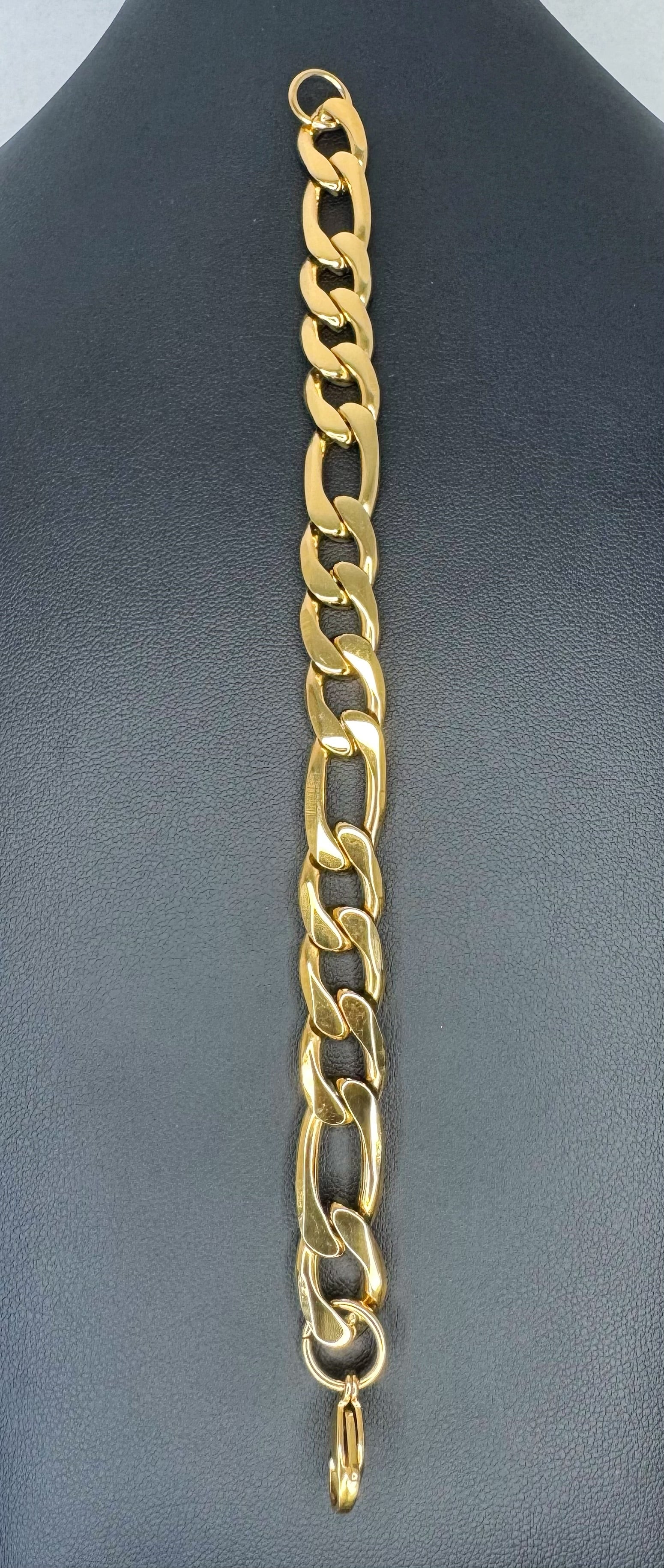 gold bracelet on black background
